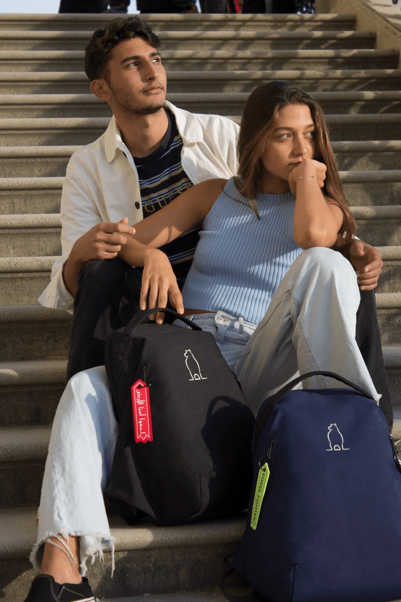 navy backpack couple