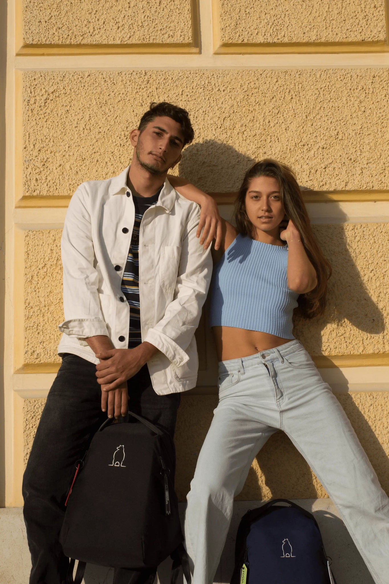 couple black backpack